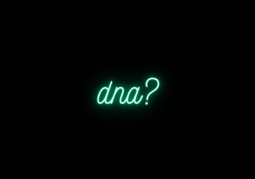 Glowing, neon aqua text on a black background that says, "dna?"